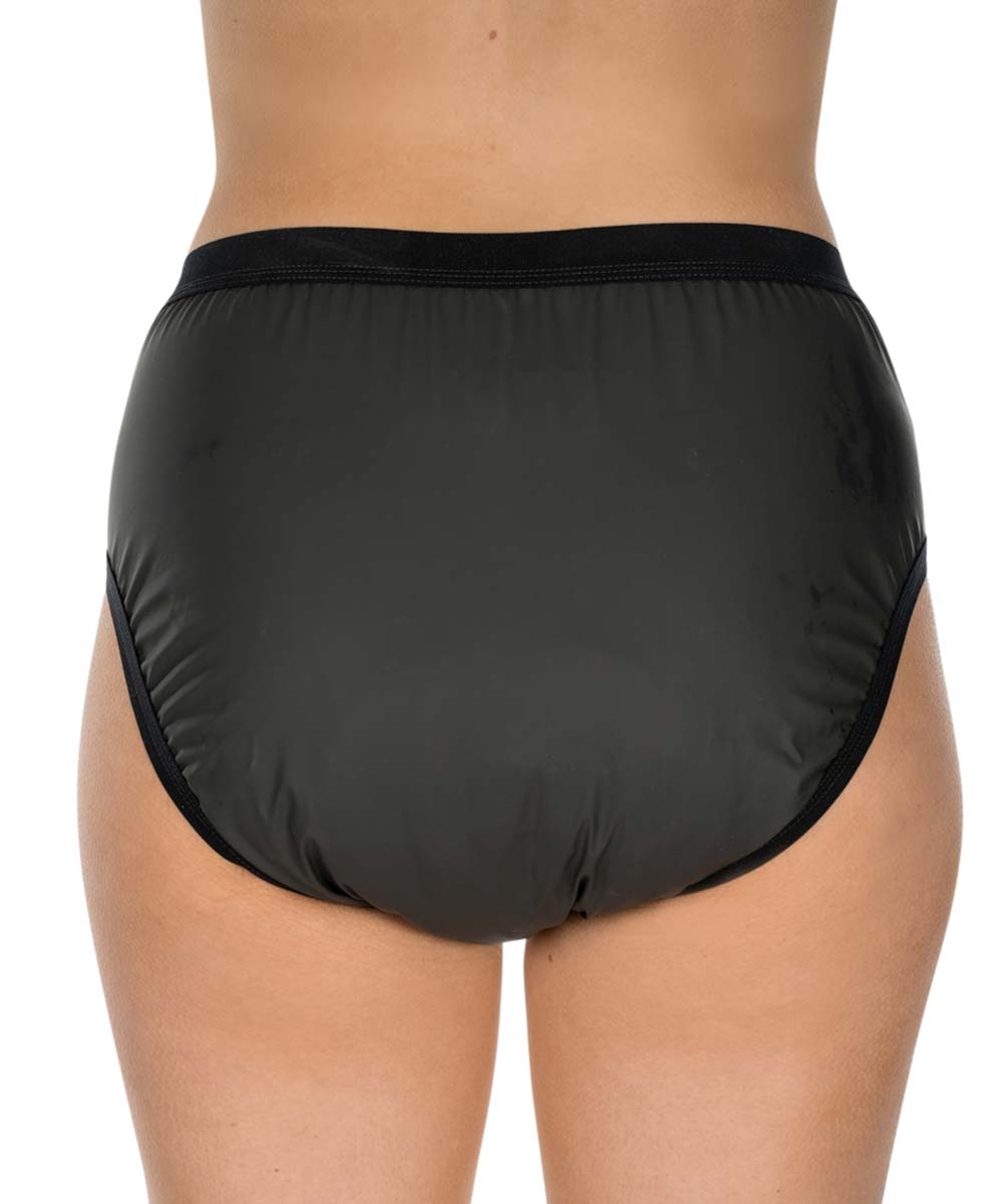 Schwarze, nahtlose Inkontinenzunterwäsche, von hinten fotografiert. Der Stoff ist glänzend und elastisch, mit einem breiten Gummibund oben. Der Hintergrund ist neutral und unauffällig.
